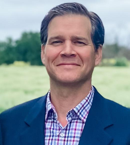 A professional headshot of Dr. Andrew McElrone. 