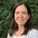 A professional headshot of Dr. Maria Maldonado. 