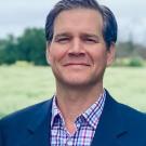 A professional headshot of Dr. Andrew McElrone. 